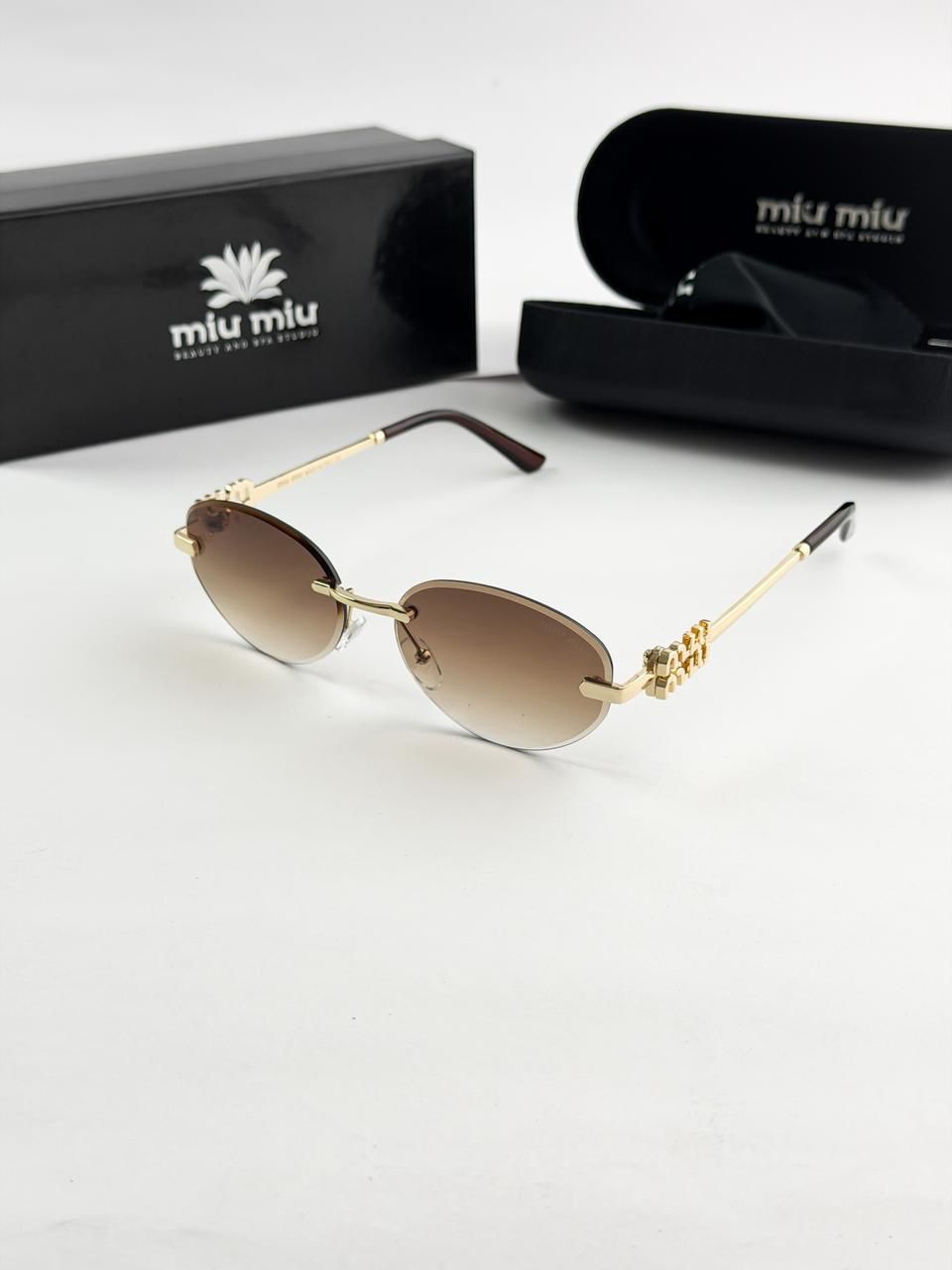 MIU MIU GOLD BROWN