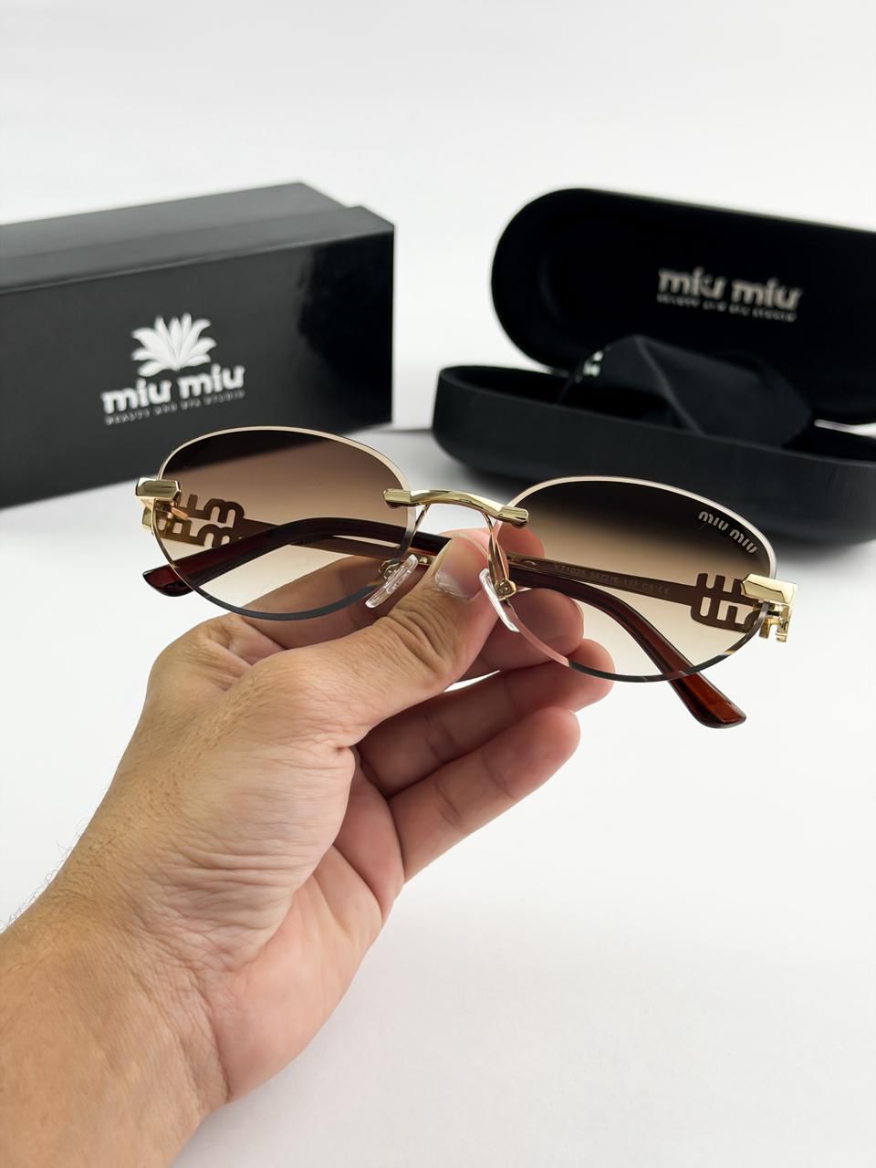 MIU MIU GOLD BROWN